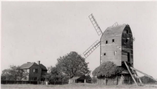 The mill in circa 1955, suffering from dilapidation and storm damage